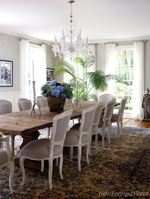 rustic wood table and upholstered chairs for dining room decorating