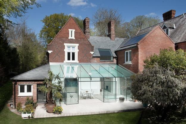 house design with glass extension, glass wall ceiling and glass doors