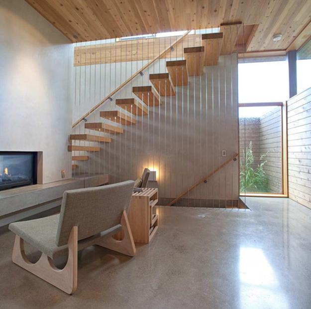 Modern House Design with Warm Wooden Interiors and Modernist Feel