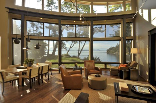 Beautiful Lakefront House With Large Windows Surrounded By