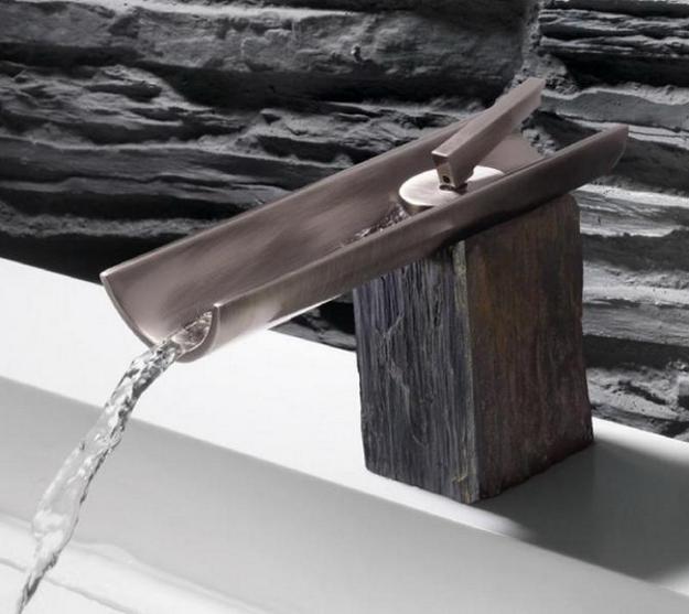 modern bathroom fixtures made of stone, wood and metal