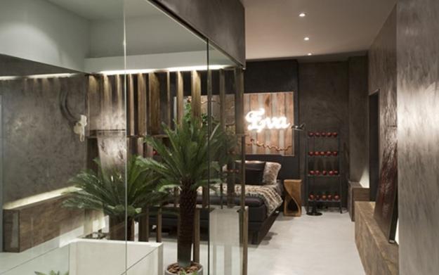 glass wall between bedroom and bathroom
