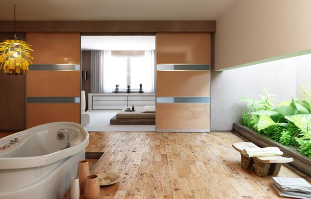 glass wall between bedroom and bathroom