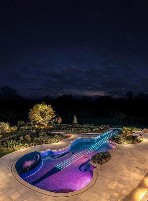 water features with outdoor lights, creative backyard designs