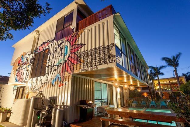 cargo container house design with graffiti artworks for wall decoration