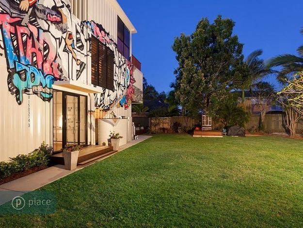 cargo container house design with graffiti artworks for wall decoration