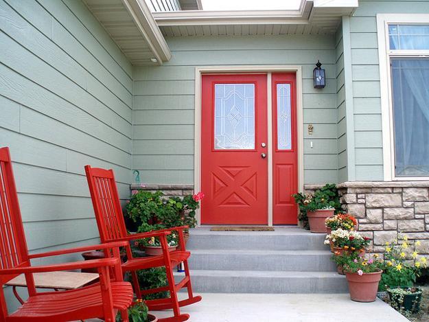 feng shui home design with red exterior door