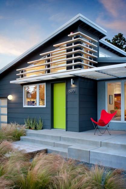 contemporary home with modern exterior, green and red accents