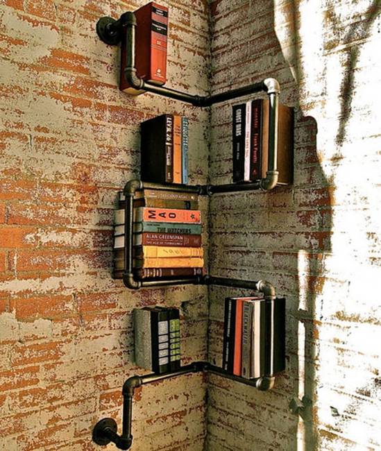 DIY shelves created with metal pipes.