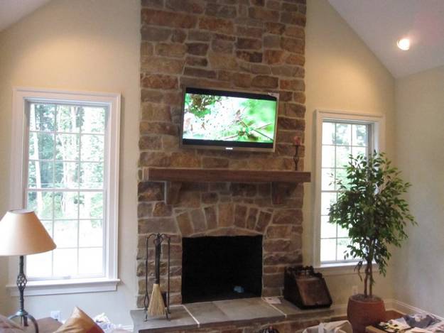 30 Multifunctional and Modern Living Room Designs with TV and Fireplace