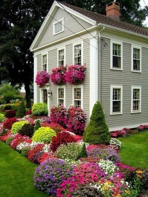 outdoor home decorating with flowers, window boxes and flower beds