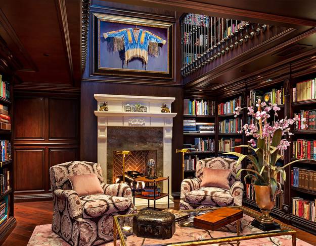 home library with fireplace