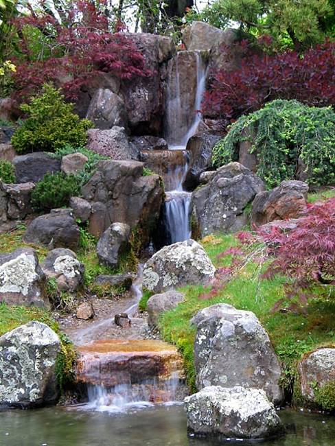 backyard and front yard landscaping with natural waterfall