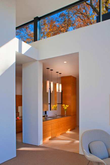 modern rooms with large windows and beautiful views of fall leaves