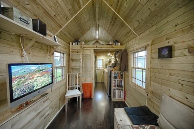 Small House with Large Windows and Space Saving Interior Design