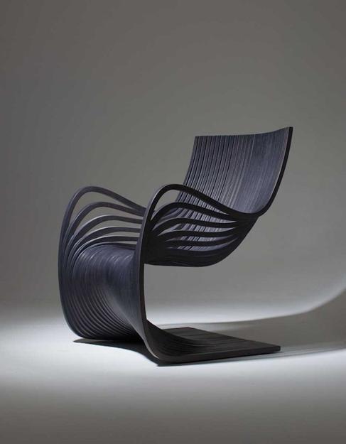 Wooden Chair Showing Movement and Material Conscious Design