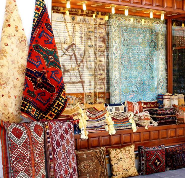 oriental interior decorating with textiles, floor rugs and decorative fabrics