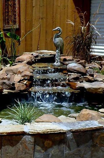 Tall waterfall idea for garden design