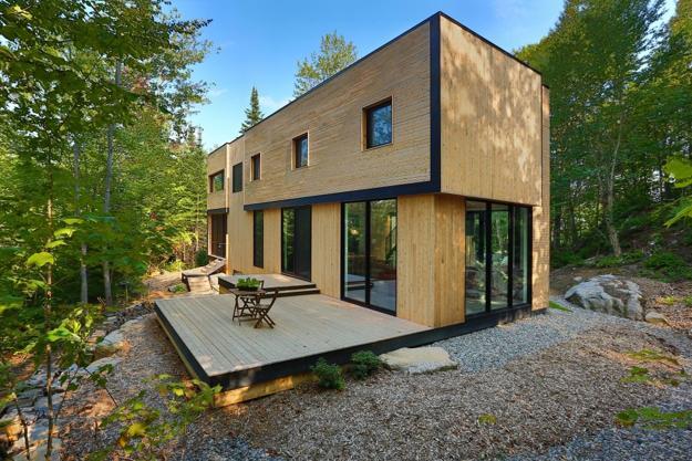 Wooden House Design with Beautiful Interiors Accentuated by Red Accents