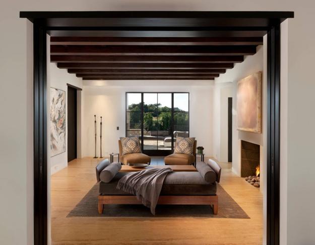 modern home interiors with dark wood ceiling beams