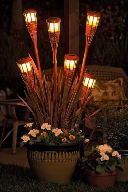 outdoor lighting design ideas with garlands and candles