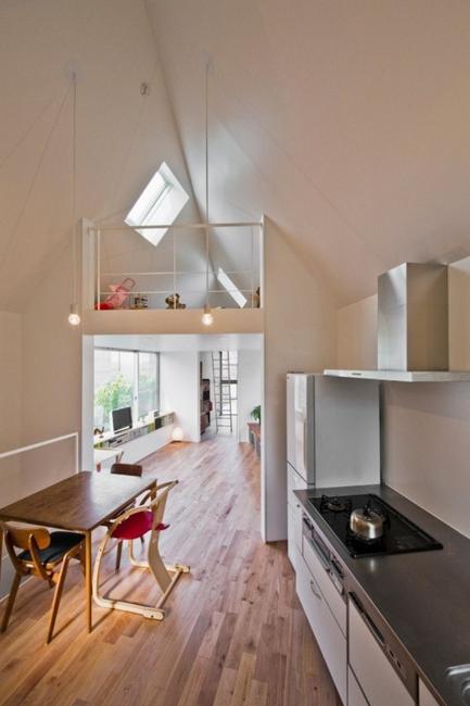 Small House Design Taking Advantage Of Triangular Lot And Offering Modern Interiors