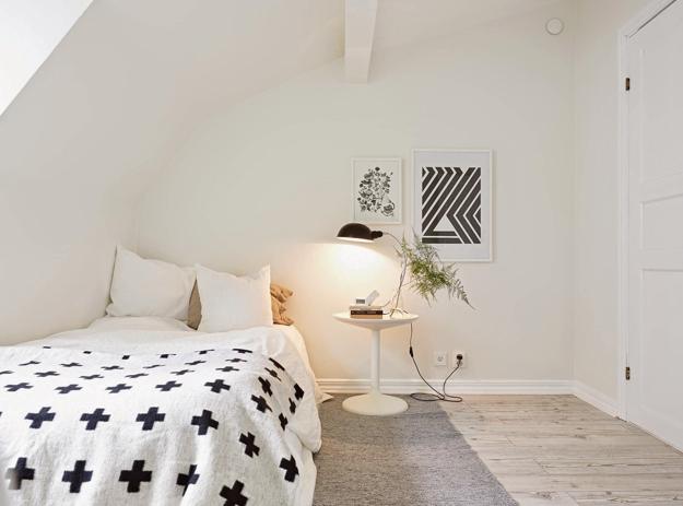 small bedroom decorating in white and black, sross and striped decoration patterns