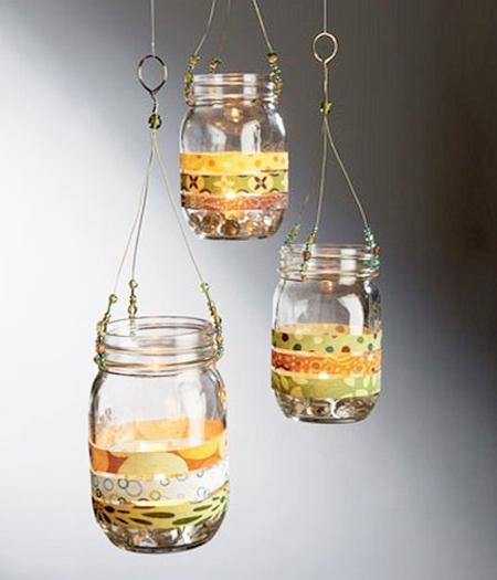 pendant lights and table lanterns with candles to reuse and recycle glass jars