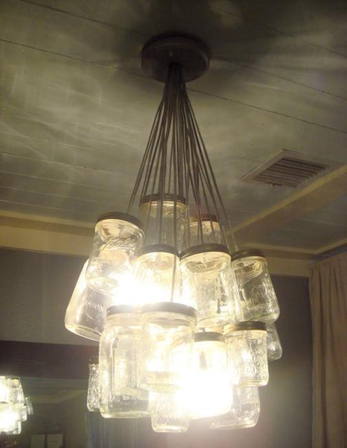 pendant lights and table lanterns with candles to reuse and recycle glass jars