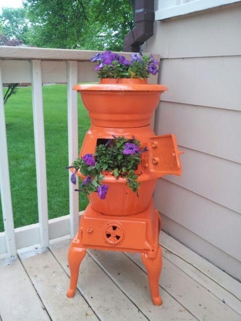 Recycling Old Stoves for Metal Planters to Save Money on