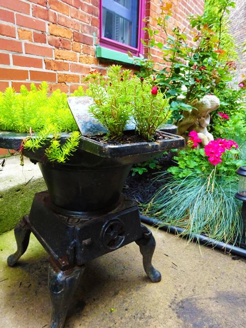 Recycling Old Stoves for Metal Planters to Save Money on