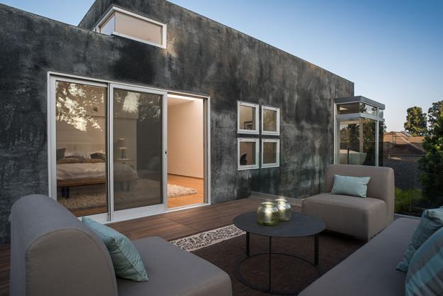 terrace with outdoor furniture and candle lights