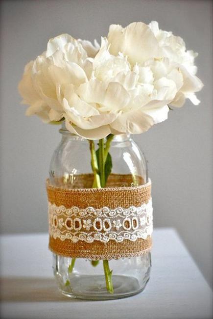 recycling glass jars for homemade vases and planters and creating beautiful flower arrangements and table centerpieces