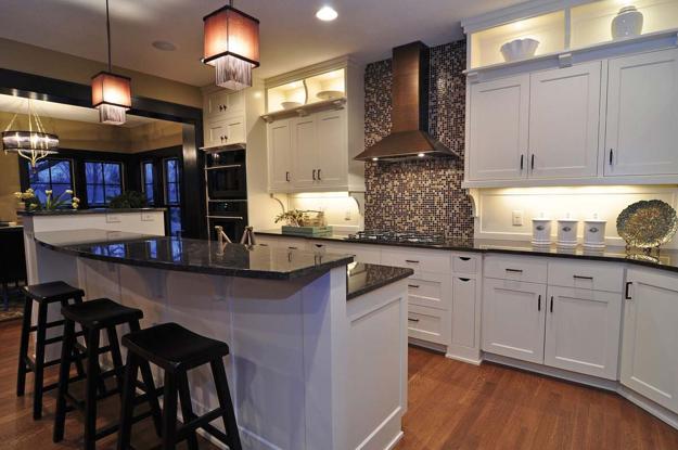 Modern Kitchen Islands with High Countertops and Bar Chairs