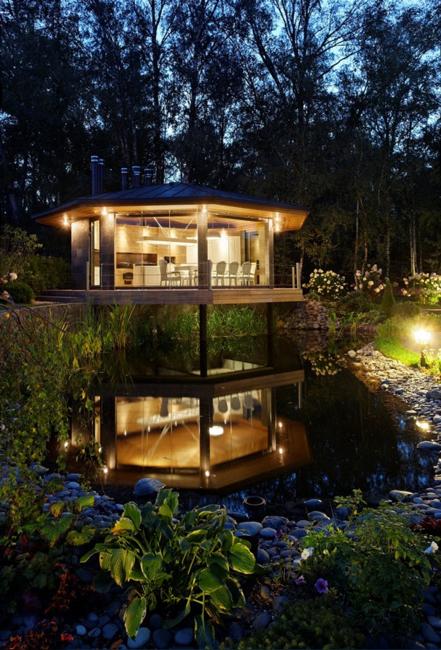 creative outdoor kitchen with dining area, glass floor and walls