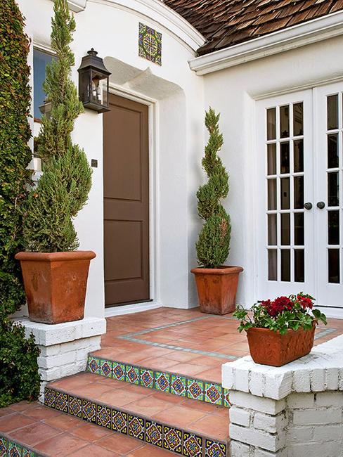 home entrance decorating with bricks and tiled steps