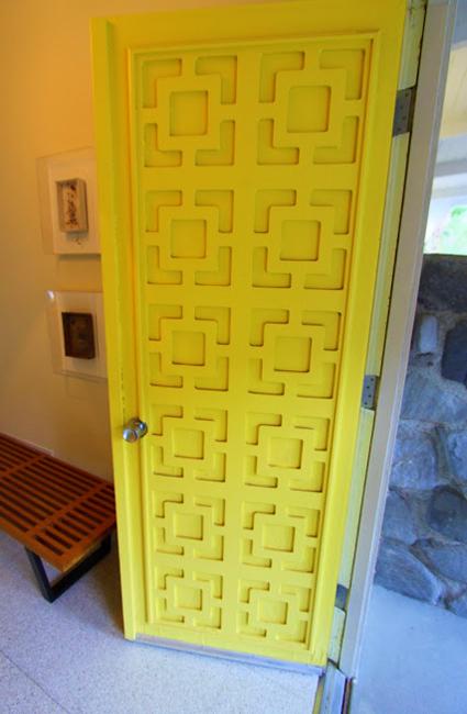 yellow door with geometric ornaments