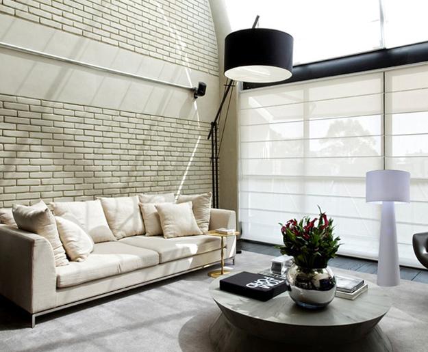 white sofa black ceiling light