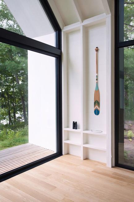 Contemporary Lakeside Cottage With Airy Modern Interiors And