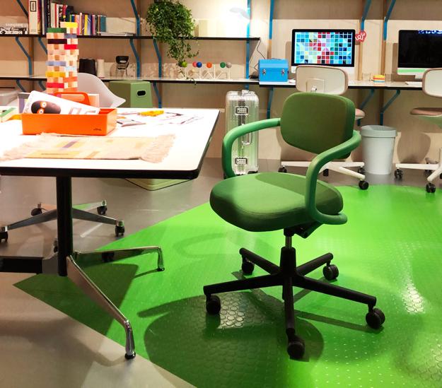 green office chair and floor painting