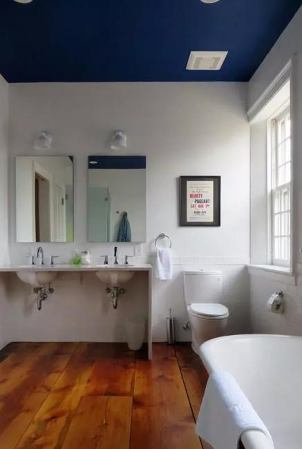 white bathroom with black ceiling