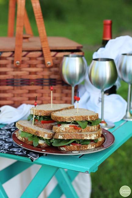 sandwiches and metal wine glasses