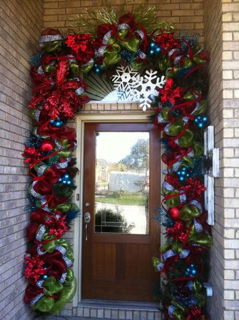 Outdoor Christmas Decorating with Green Garlands and Winter Holiday Wreaths