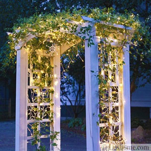 Outdoor Christmas Decorating with Green Garlands and Winter Holiday Wreaths