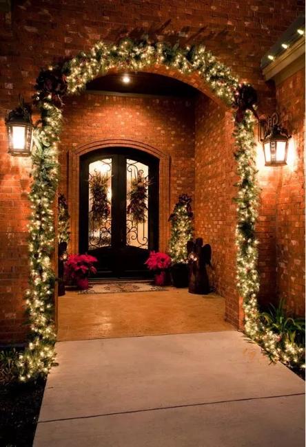 Outdoor Christmas Decorating with Green Garlands and Winter Holiday Wreaths