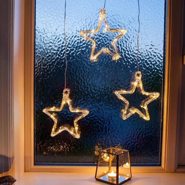 Star Power of Christmas Lights to Brighten Up Window Decorating