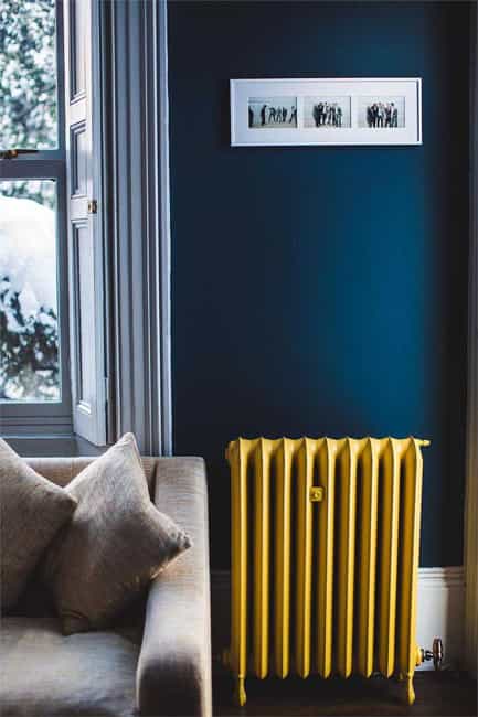yellow radiator blue wall paint