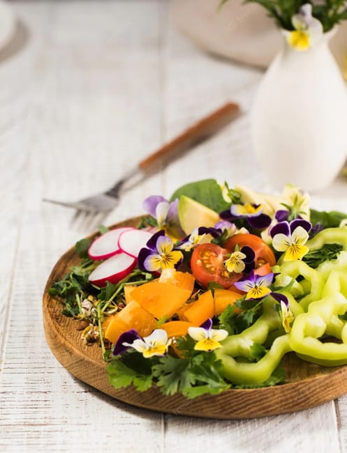 Colorful Food Decoration with Edible Flowers and Grasses