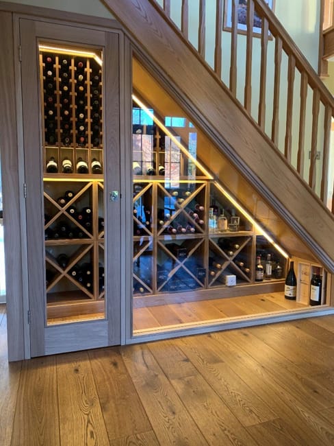 wine cellar under staircase