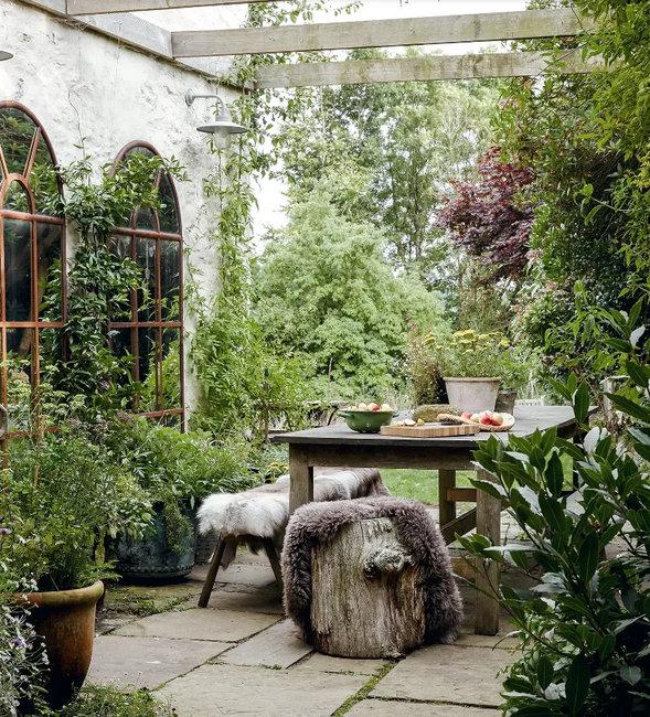 stone patio wooden furniture